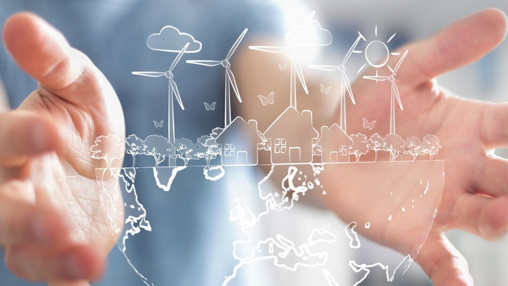 Animation: Hand hält Weltkugel, oberhalb Häuser mit Windrädern